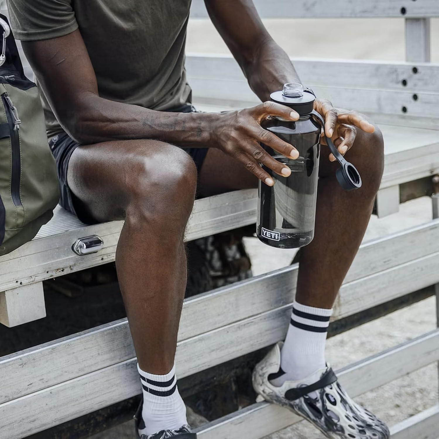 imageYETI Yonder Water Bottle with Yonder Tether Cap Lightweight Leakproof and BPAFreeCosmic Lilac