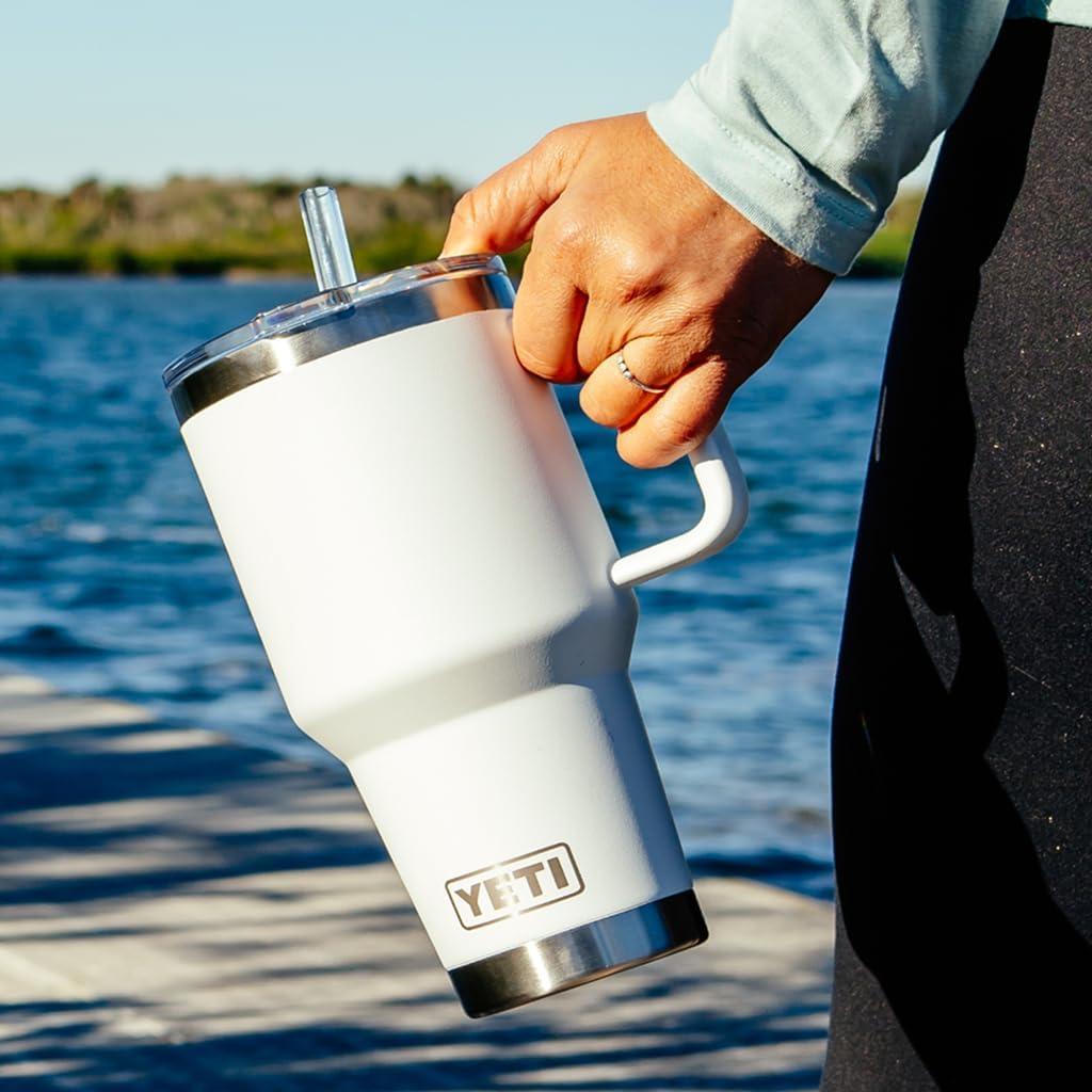 imageYETI Rambler 35 oz Straw Mug 20 DoubleWall Vacuum Insulation for Cold Beverages Dishwasher Safe Cupholder Compatible Reusable Straw Comfortable Grip Handle Travel Mug RidgelineWhite